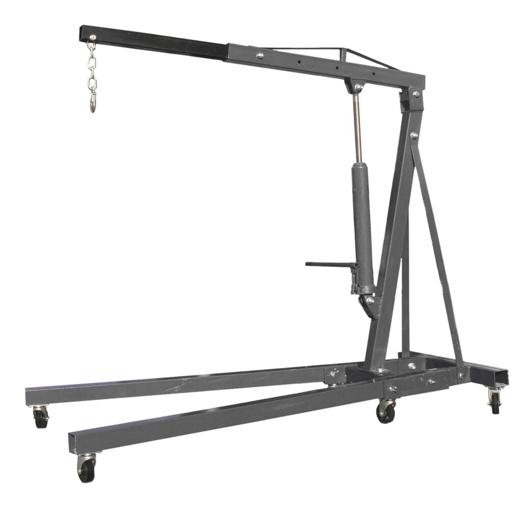 Mobiler Werkstattkran von TB Gradient mit hydraulischem Hubzylinder, ausziehbarem Auslegerarm, stabiler Stahlrahmenkonstruktion und vier Lenkrollen, geeignet zum sicheren Heben und Positionieren schwerer Motoren und Bauteile in der Werkstatt.